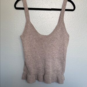 The drop knit tank with ruffle detail